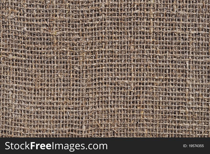 Fragment of rustic sack texture background. Fragment of rustic sack texture background