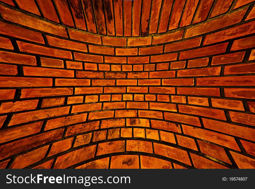 Old orange brick wall pattern texture blast out background. Old orange brick wall pattern texture blast out background