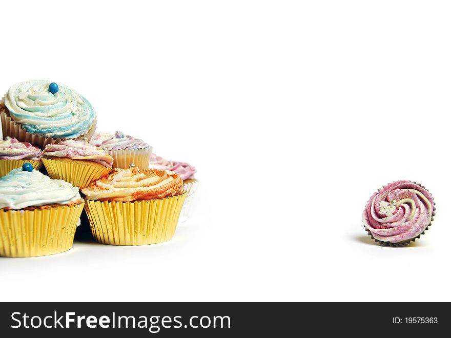 One small cupcake isolated from the rest. One small cupcake isolated from the rest