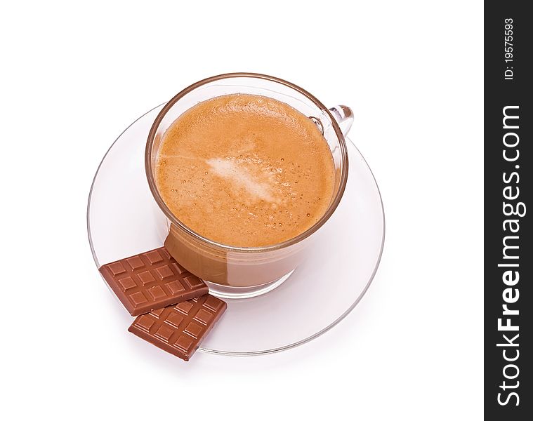 Coffee in a glass cap and chocolate on the white