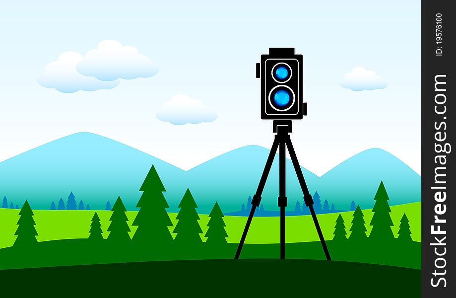 Camera In Green Landscape