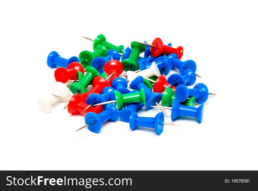 Colorful plastic push pins isolated on white