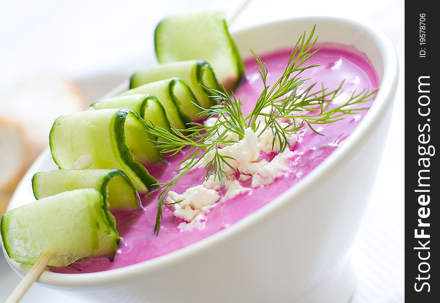 Cold borscht - speciality for hot days. Vegetable cold soup with beetrots. Shallow depth of field, selective focus. Cold borscht - speciality for hot days. Vegetable cold soup with beetrots. Shallow depth of field, selective focus