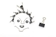 Clips  Happy Face Looking At A Clip Royalty Free Stock Photography