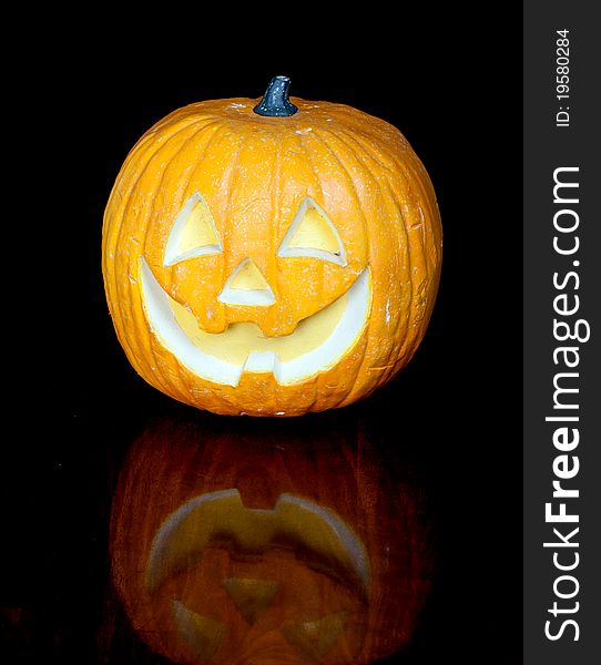 A photograph of a halloween pumpkin.