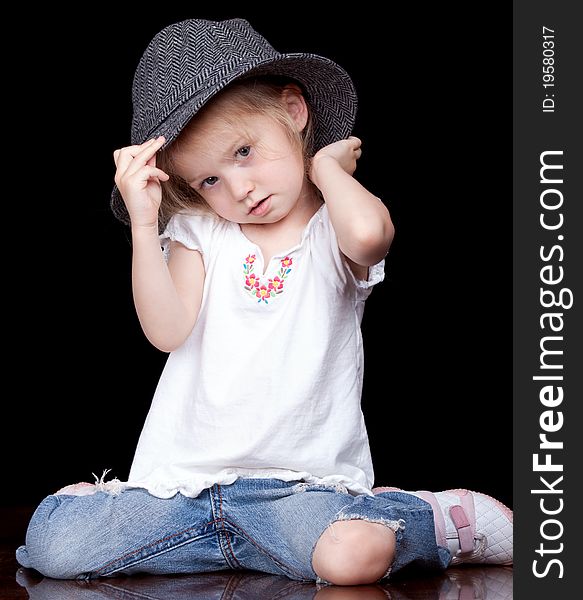 An adorable child in her cute little hat!. An adorable child in her cute little hat!