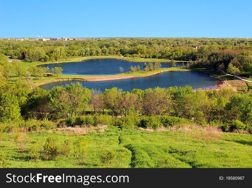 Summer landscape in the park, with blue skies and lakes.