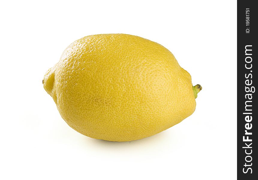 Alone yellow fresh lemon on the white background