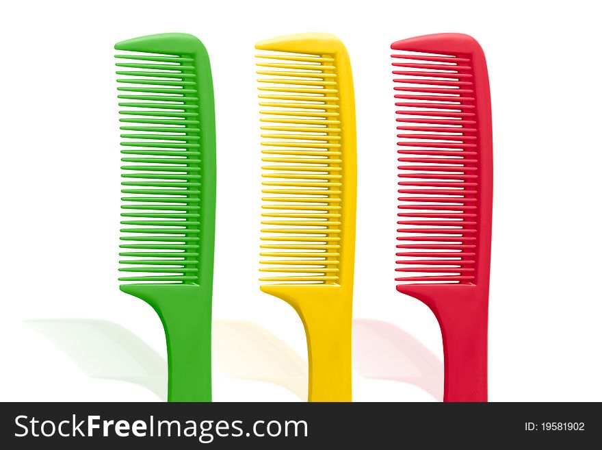 Three combs isolated on a white background. Three combs isolated on a white background