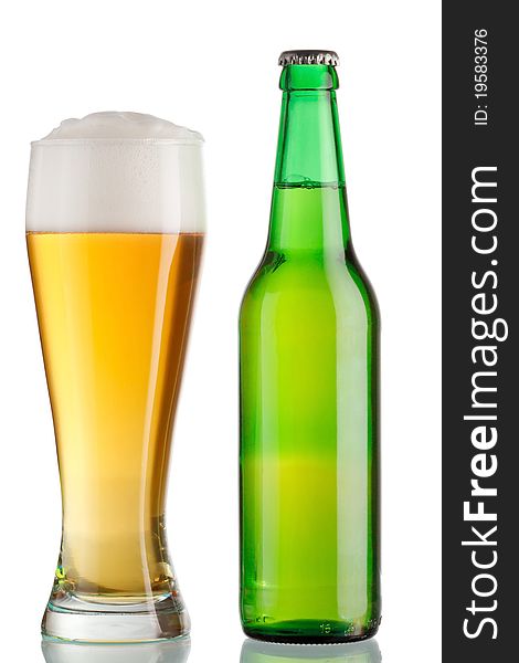 Cup and a bottle of beer on white background. Cup and a bottle of beer on white background