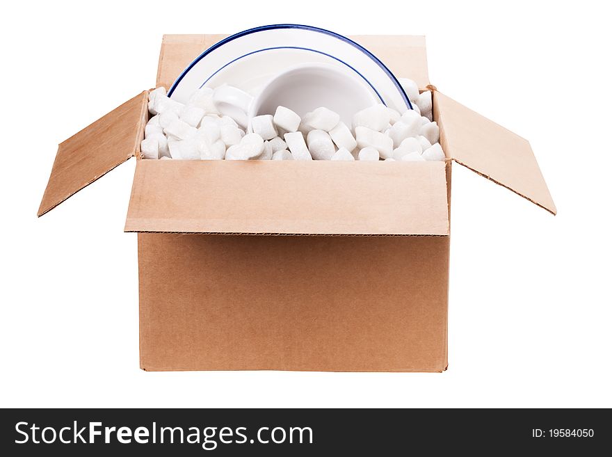 An isolated box with styrofoam and dishes. An isolated box with styrofoam and dishes