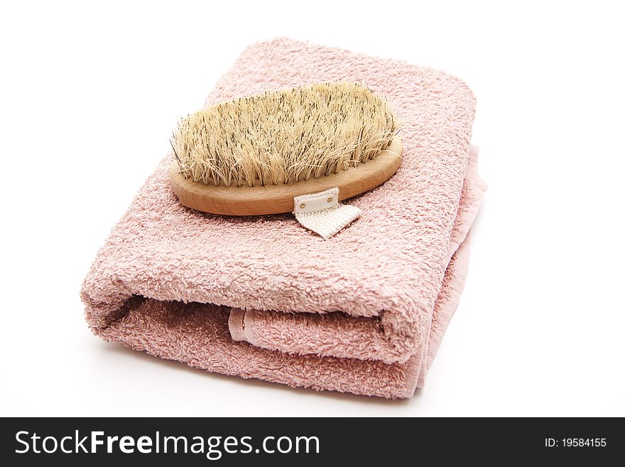 Back brush with bristles on towel