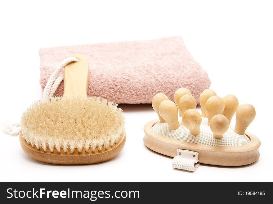 Back brush and massage brush on towel