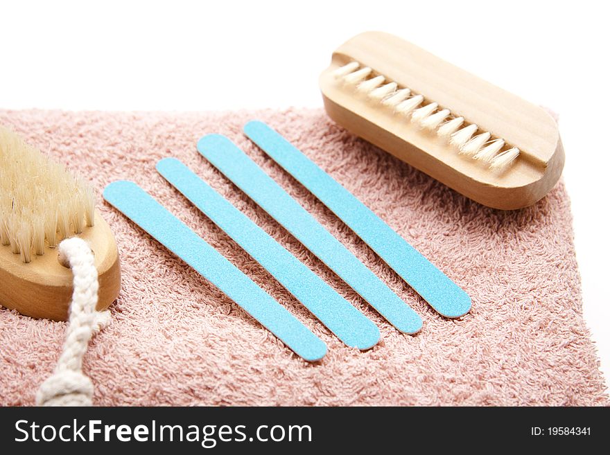 Fingernail file with nail brush with towel