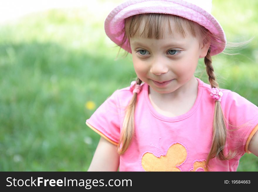 Portrait of laughing little girl outdoor
