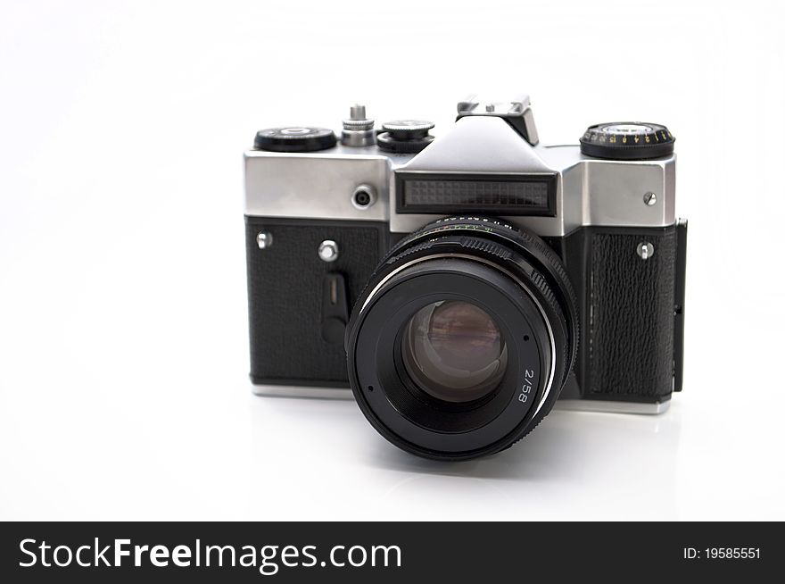 Old camera isolated over white background