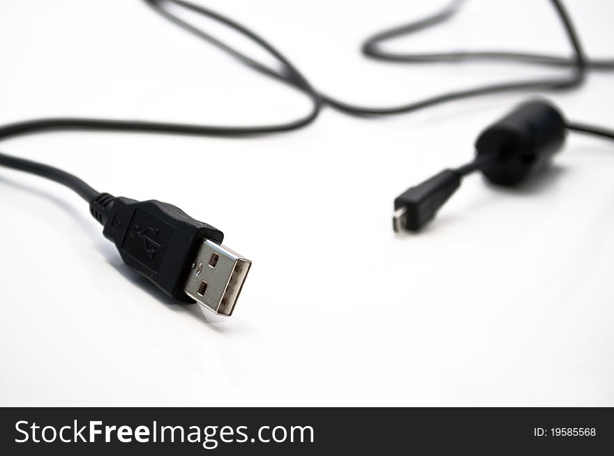 Usb cables over white background