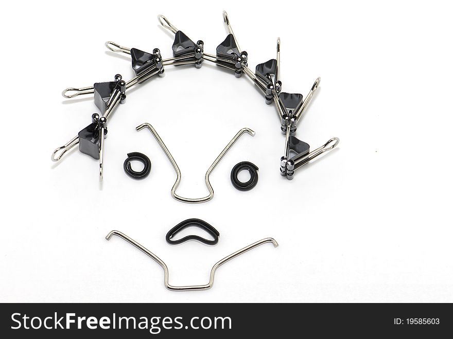 Binder clips' rendition of an angry and stressed face. Binder clips' rendition of an angry and stressed face