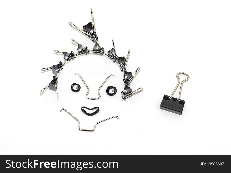 Binder clips' rendition of an happy face looking at a clip. Binder clips' rendition of an happy face looking at a clip