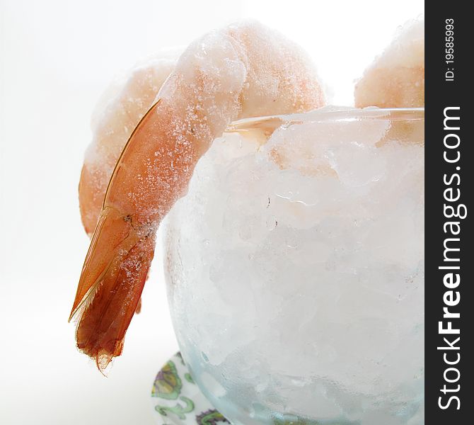 Closeup of frosty shrimp cocktail on a white background. Closeup of frosty shrimp cocktail on a white background