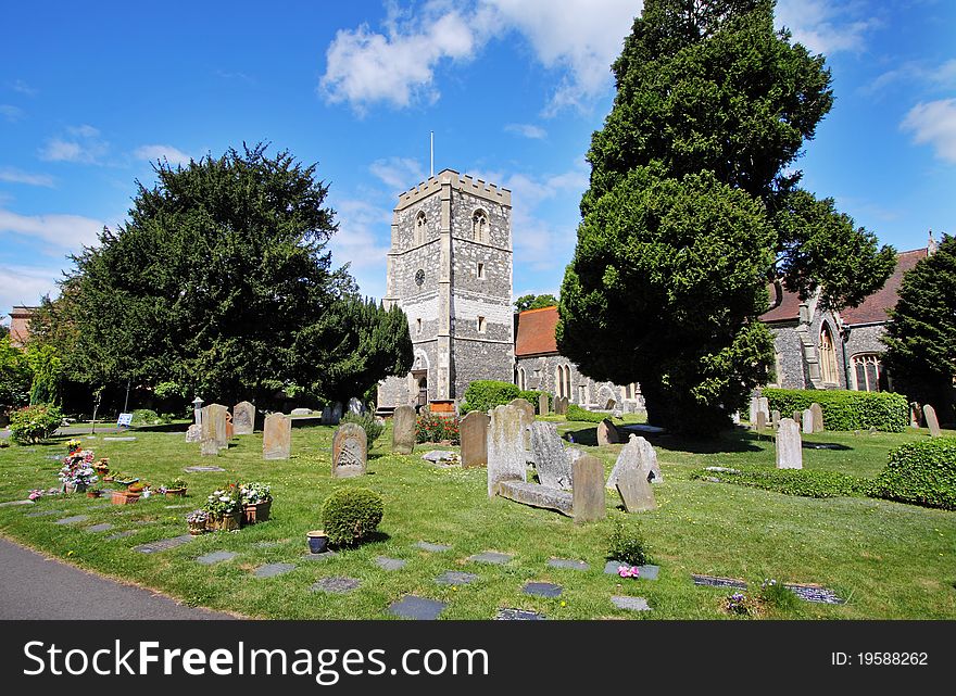 English Village Church with Tower viewed from the graveyard. English Village Church with Tower viewed from the graveyard