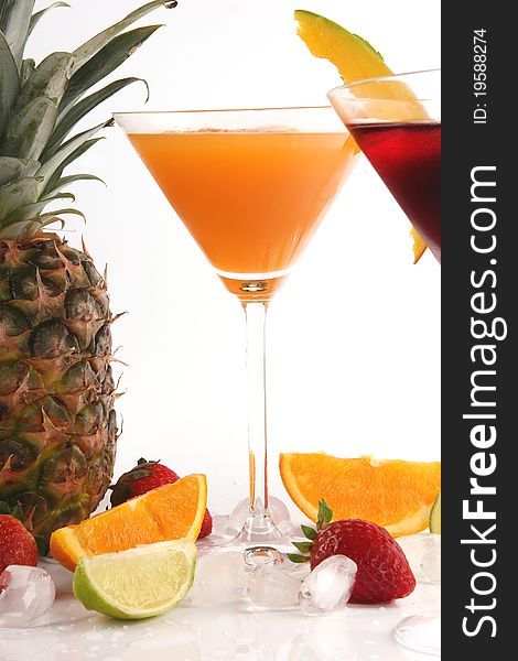 Tropical Martini drinks with fruits on white background. Tropical Martini drinks with fruits on white background