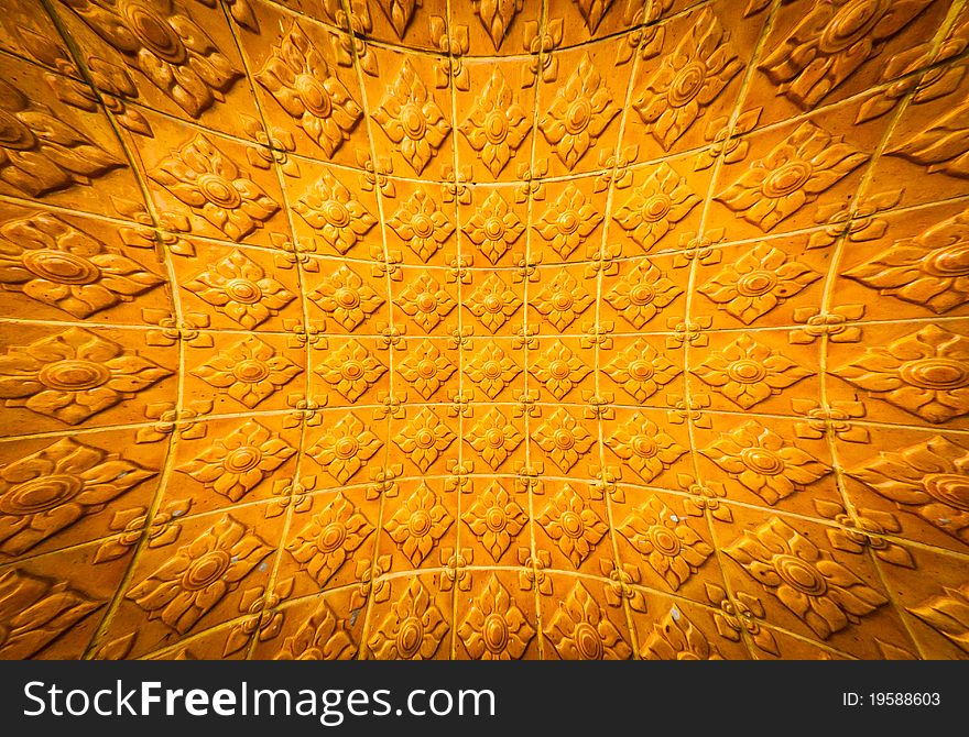 Thai golden temple wall with a flower pattern. Thai golden temple wall with a flower pattern