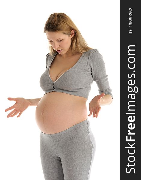 Astonished Pregnant Woman In Gray Suit
