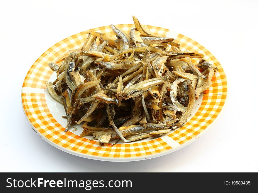 Dried salted fish on white background. Dried salted fish on white background