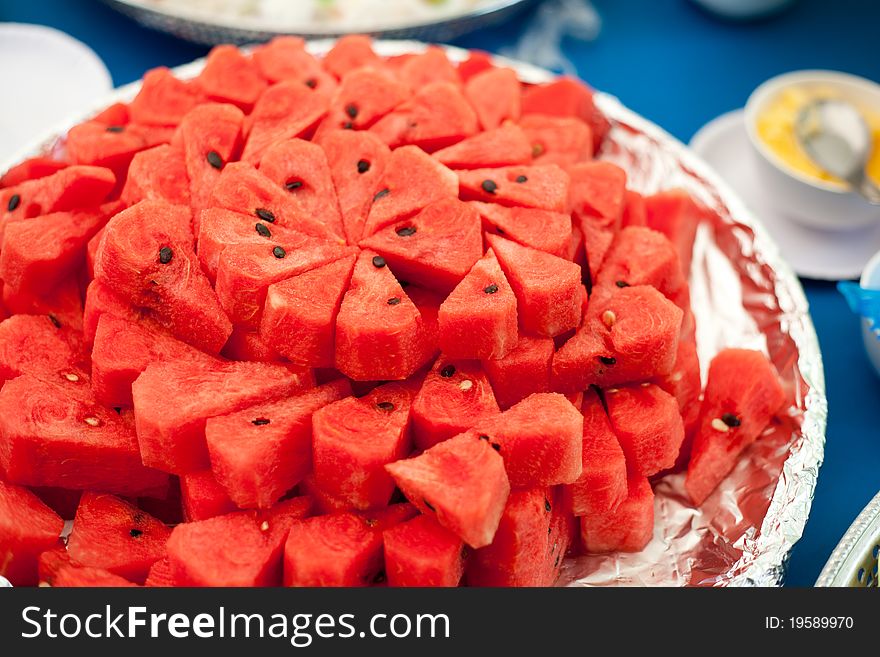 Red watermelon on dish