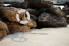 Lifebuoy Hangs On A Stick On The Beach Stock Photography Lifebuoy Hangs On A Stick On The Beach Stock Photography