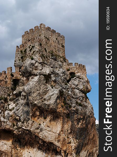 Ruins of a medieval castle on the rock in Zuheros village in Spain