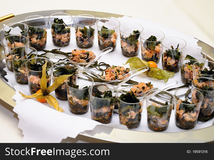 Appetizer of seafood, salmon, seaweed. Appetizer of seafood, salmon, seaweed