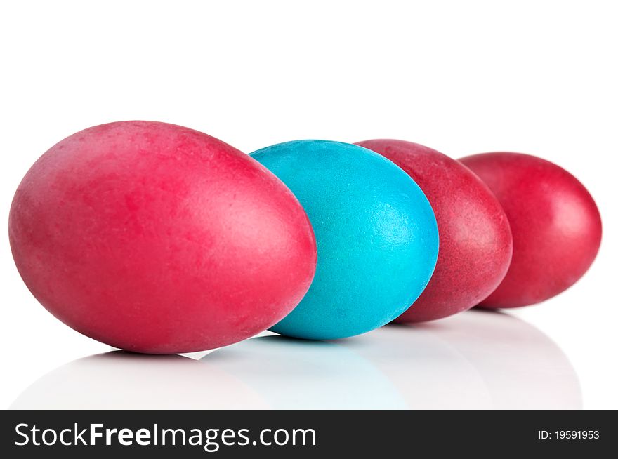 Red and blue eggs isolated on a white background