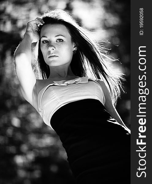 Young pretty woman portrait. black and white film stylization