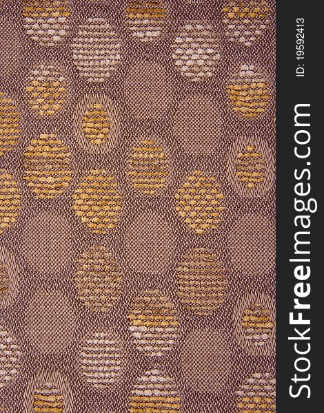 Brown Upholstery Textile Material with Yellow and Brown Circles. Brown Upholstery Textile Material with Yellow and Brown Circles