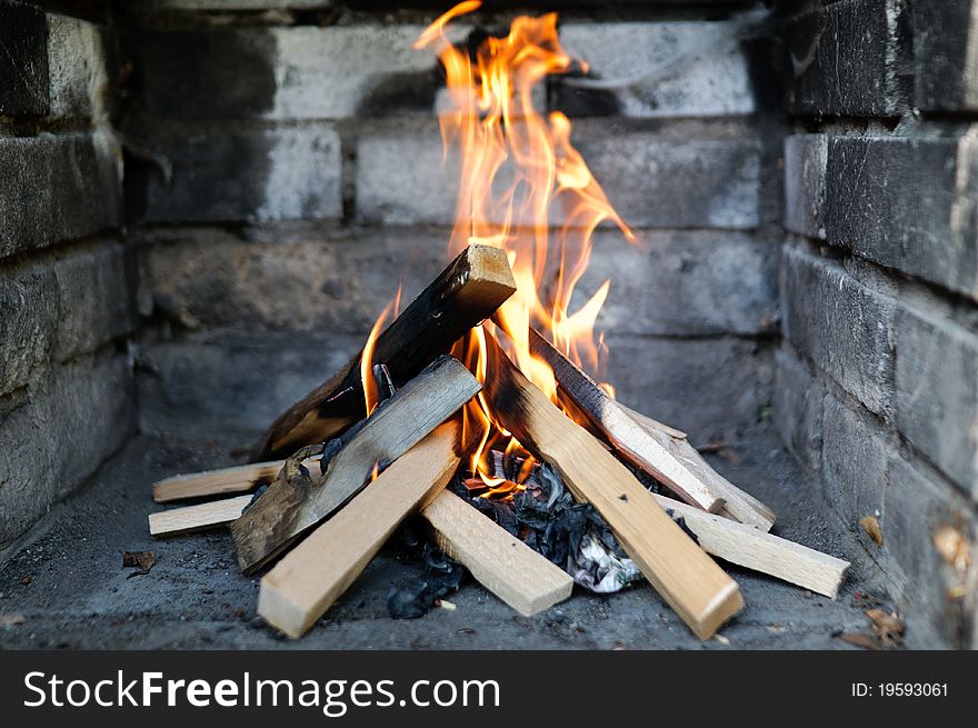 Burning wood in the fireplace