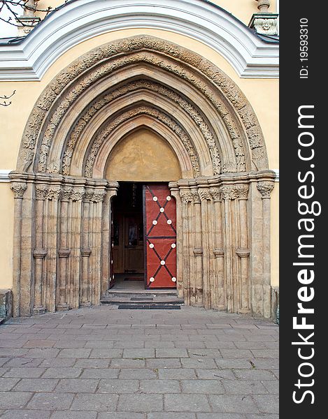 Castle door during the daytime, vertical shot.