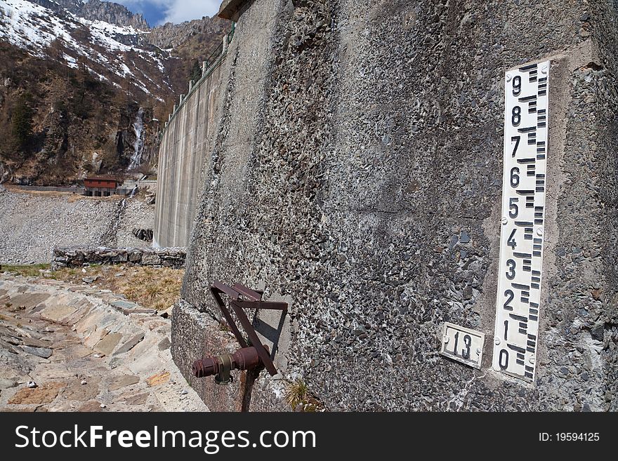 Dam at the end of Arno man-made lake basin at 1900 meters on the sea-level. Brixia province, Lombardy region, Italy