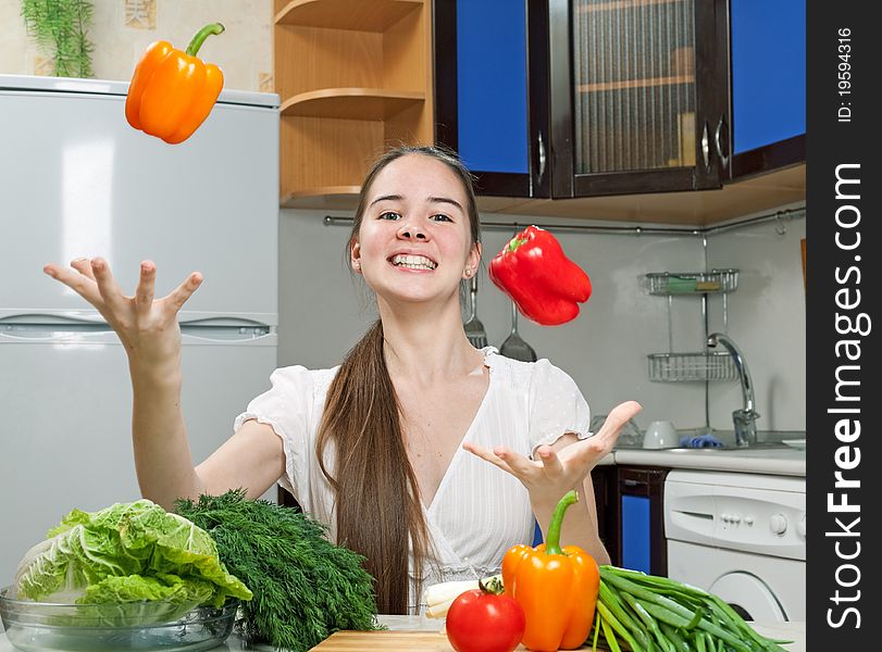 Young Beautiful Caucasian Woman In The Kitchen