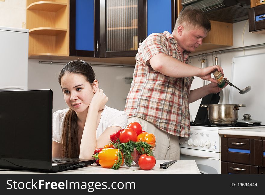 Young Beautiful Caucasian Woman In The Kitchen