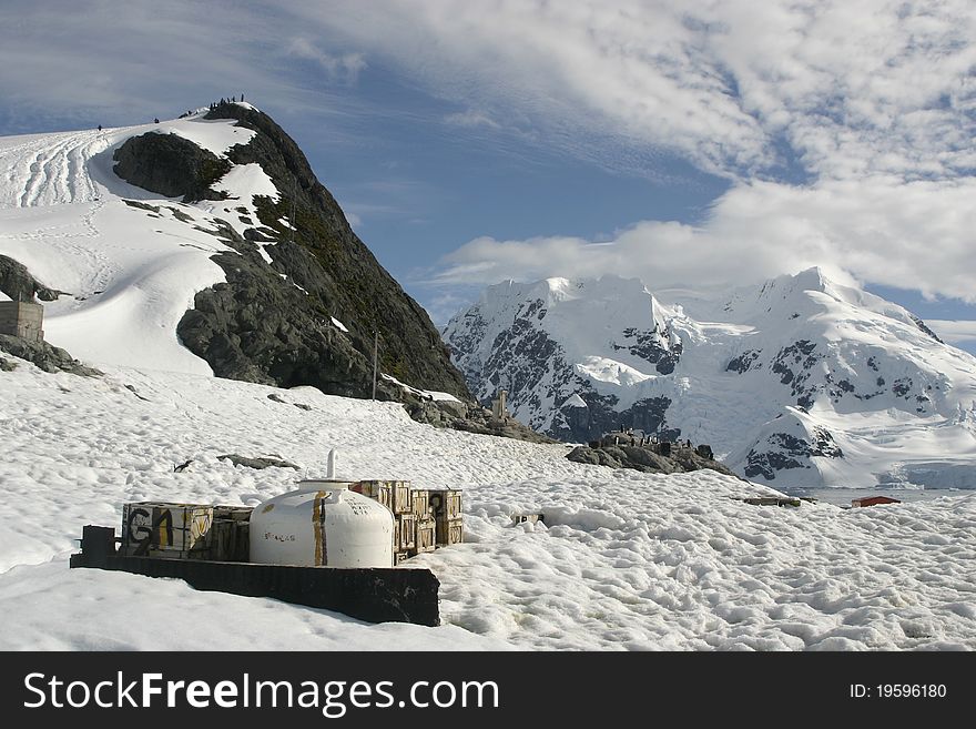 Scenery in Antarctica, the frozen continent, abandoned container and boxes. Scenery in Antarctica, the frozen continent, abandoned container and boxes