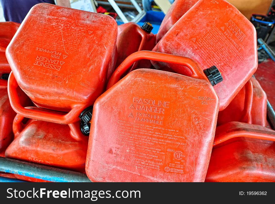 Photo of Improperly keep Red Gasoline Can with safety reminder