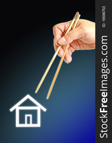 Hand and icon house with chopsticks