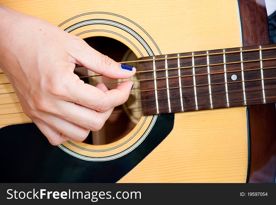 Girl playing acoustic song by guitar. Girl playing acoustic song by guitar