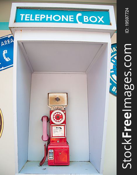 Red public telephone in box