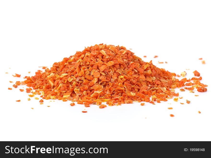 Pile of grinded dried carrot isolated on the white background