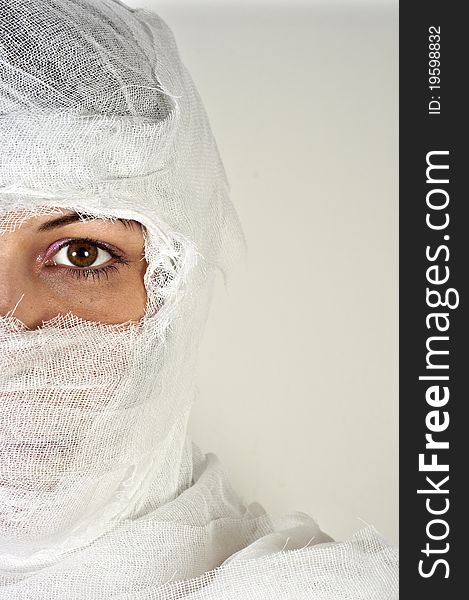 Girl after accident against white isolated background