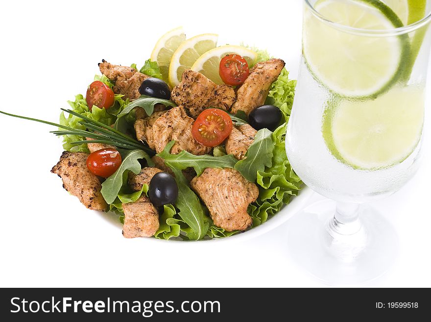 Chicken and vegetable salad with ice cold drink isolated over white background. Chicken and vegetable salad with ice cold drink isolated over white background