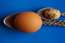 Eggs And Spoons Royalty Free Stock Photos